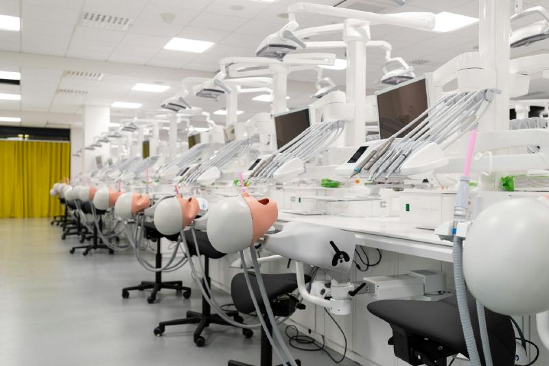 The skills laboratory at the University of Helsinki is equipped with 59 Planmeca Compact iSim simulation units and three Planmeca Compact i Classic dental units for live demonstrations. (Image: Planmeca)